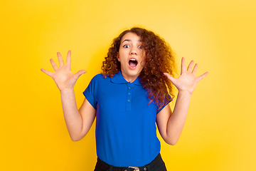 Image showing Caucasian teen\'s girl portrait on yellow background