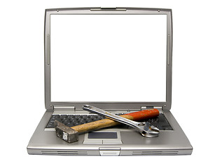 Image showing laptop and tools