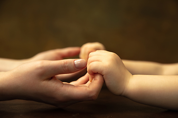 Image showing Close up of female and kid\'s hands doing things together, family, home concept