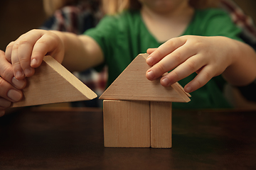 Image showing Close up of female and kid\'s hands doing things together, family, home concept