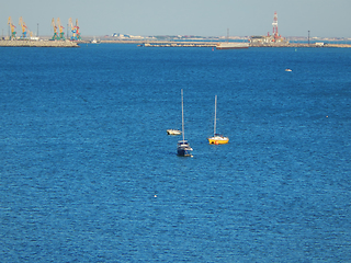 Image showing Yachts and boat at sea.