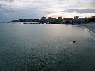 Image showing Rocky seashore at sunset.