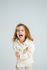 Image showing Pretty caucasian girl portrait isolated on white studio background with copyspace