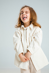 Image showing Pretty caucasian girl portrait isolated on white studio background with copyspace