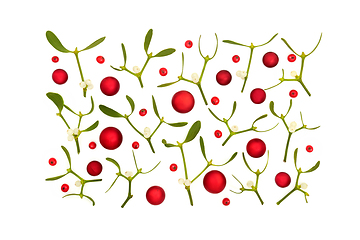 Image showing Christmas Festive Scene with Baubles Berries and Mistletoe