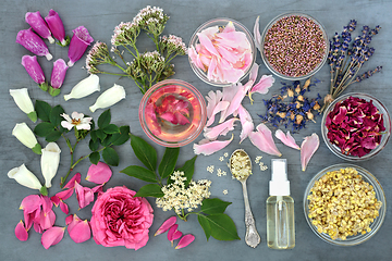 Image showing Essential Oil Preparation with Herbs and Flowers