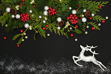 Image showing Christmas Abstract Composition with Reindeer and Winter Greenery