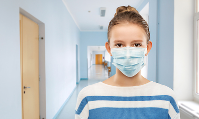 Image showing teenage girl in medical mask over school corridor