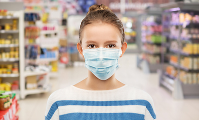 Image showing teenage girl in mask over supermarket