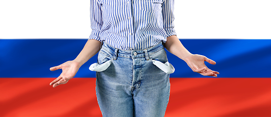 Image showing close up of woman showing empty pockets