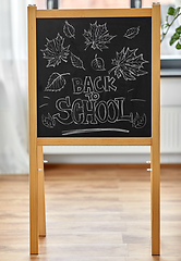 Image showing back to school lettering on chalkboard at home