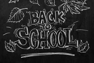 Image showing back to school lettering drawn on chalkboard