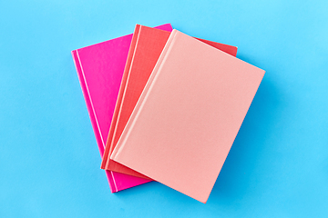 Image showing notebooks or books on blue background