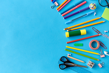 Image showing stationery or school supplies on blue background