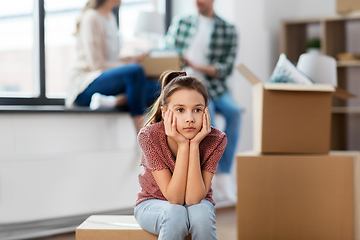 Image showing sad girl moving to new home with her family