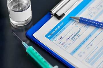 Image showing medical report, pen, syringe and medicine