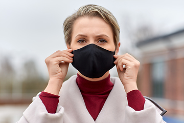 Image showing woman wearing protective reusable barrier mask