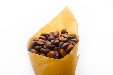 Image showing espresso coffee beans on a paper cone