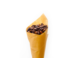 Image showing espresso coffee beans on a paper cone