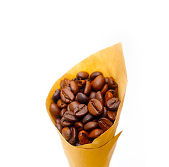 Image showing espresso coffee beans on a paper cone