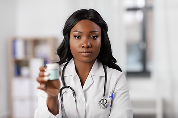 Image showing african american doctor with medicine at hospital