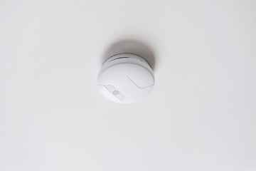 Image showing smoke alarm, sensor or detector on white ceiling