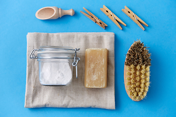 Image showing brush, washing soda, soap, scoop and clothespins