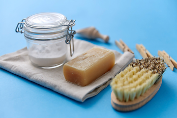 Image showing brush, washing soda, soap, scoop and clothespins