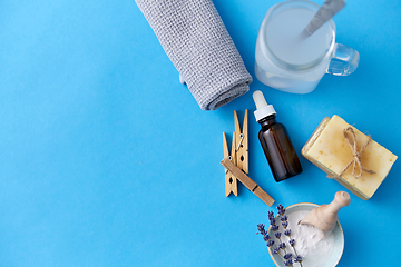 Image showing washing soda, soap, towel, dropper and clothespins