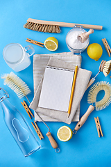 Image showing notebook with pencil and natural cleaning supplies