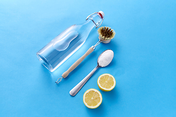 Image showing lemons, washing soda, bottle of vinegar and brush