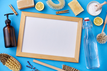 Image showing natural cleaning supplies around white board