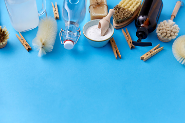 Image showing soda, vinegar, clothespins, soap and brushes