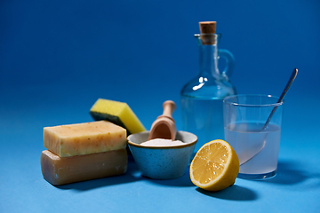 Image showing washing soda, lemon, sponge, soap and vinegar