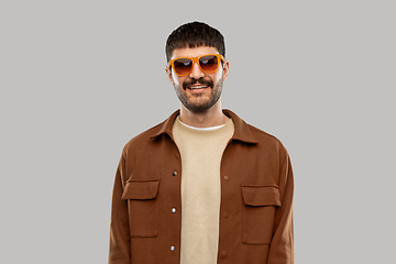 Image showing smiling young man in sunglasses