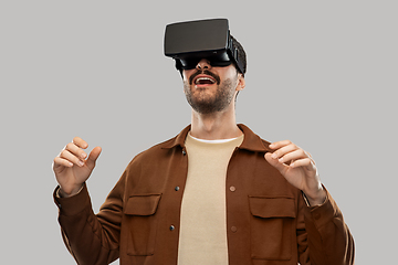 Image showing happy smiling young man in vr glasses