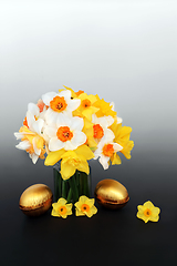 Image showing Gold Easter Eggs with Daffodil and Narcissus Flowers