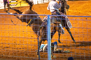 Image showing cowboy rodeo championship in the evening