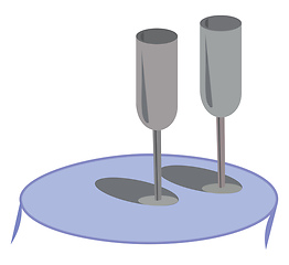 Image showing Elegant grey glasswares lying on a blue coffee table vector or c