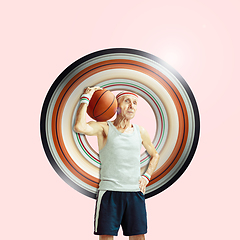 Image showing Full length portrait of a basketball player with ball