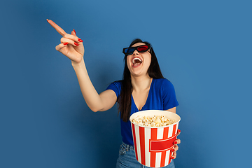 Image showing Caucasian woman\'s portrait isolated on blue studio background