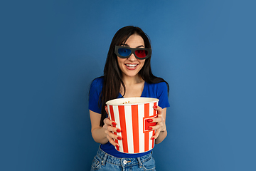 Image showing Caucasian woman\'s portrait isolated on blue studio background