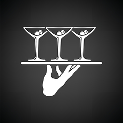 Image showing Waiter hand holding tray with martini glasses icon