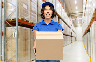 Image showing happy delivery girl with parcel box at warehouse