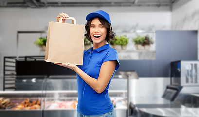 Image showing delivery woman with takeaway food in paper bag