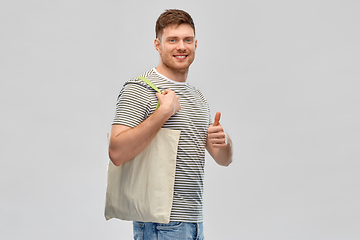 Image showing man with reusable canvas bag for food shopping