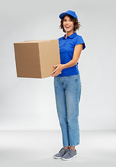 Image showing happy smiling delivery woman with parcel box