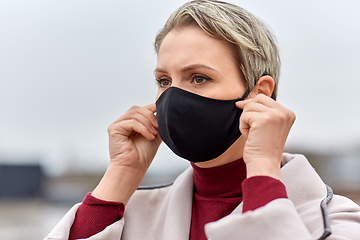 Image showing woman wearing protective reusable barrier mask