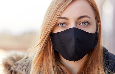 Image showing woman wearing protective reusable barrier mask