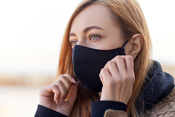 Image showing woman wearing protective reusable barrier mask